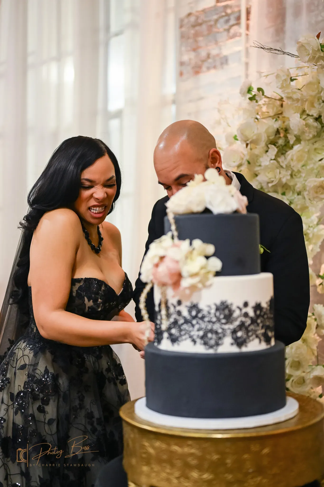 Three-tier custom wedding cake on display at an Indianapolis wedding venue, the dessert centerpiece for a downtown reception.