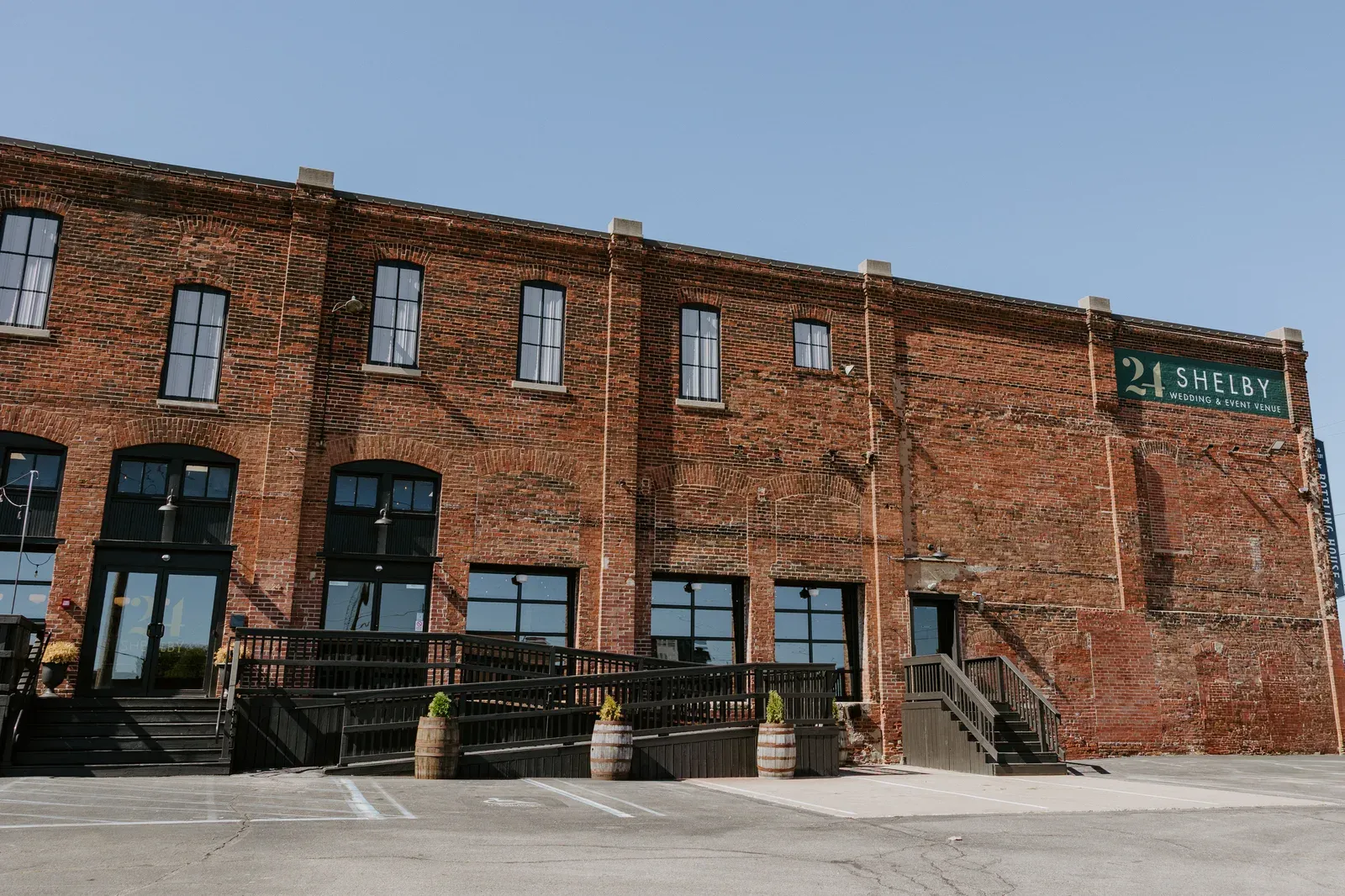 Exterior of 24 Shelby in downtown Indianapolis showing the historic 24 Shelby Bottling Company sign on the original 1898 building, the only surviving pre-Prohibition brewery in Indianapolis and the city's most distinctly historic wedding venue