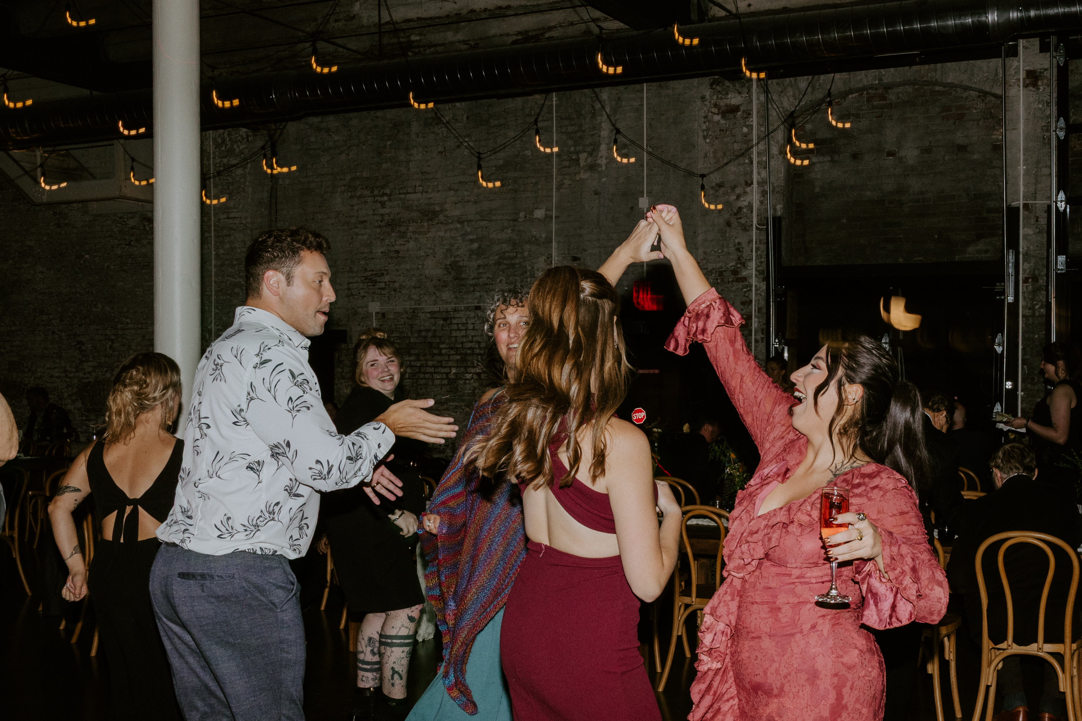 The bar and barrel wall inside 24 Shelby's Libations Lounge